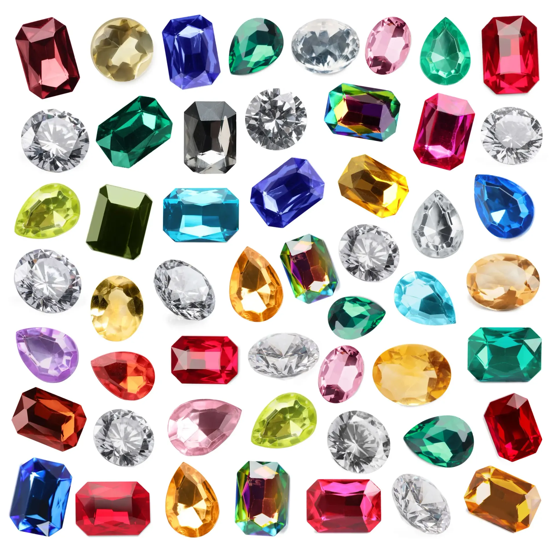 An assortment of colorful faceted gemstones.