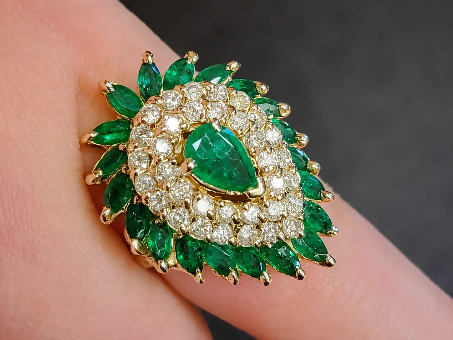 Emerald and diamond halo ring restored in-house.