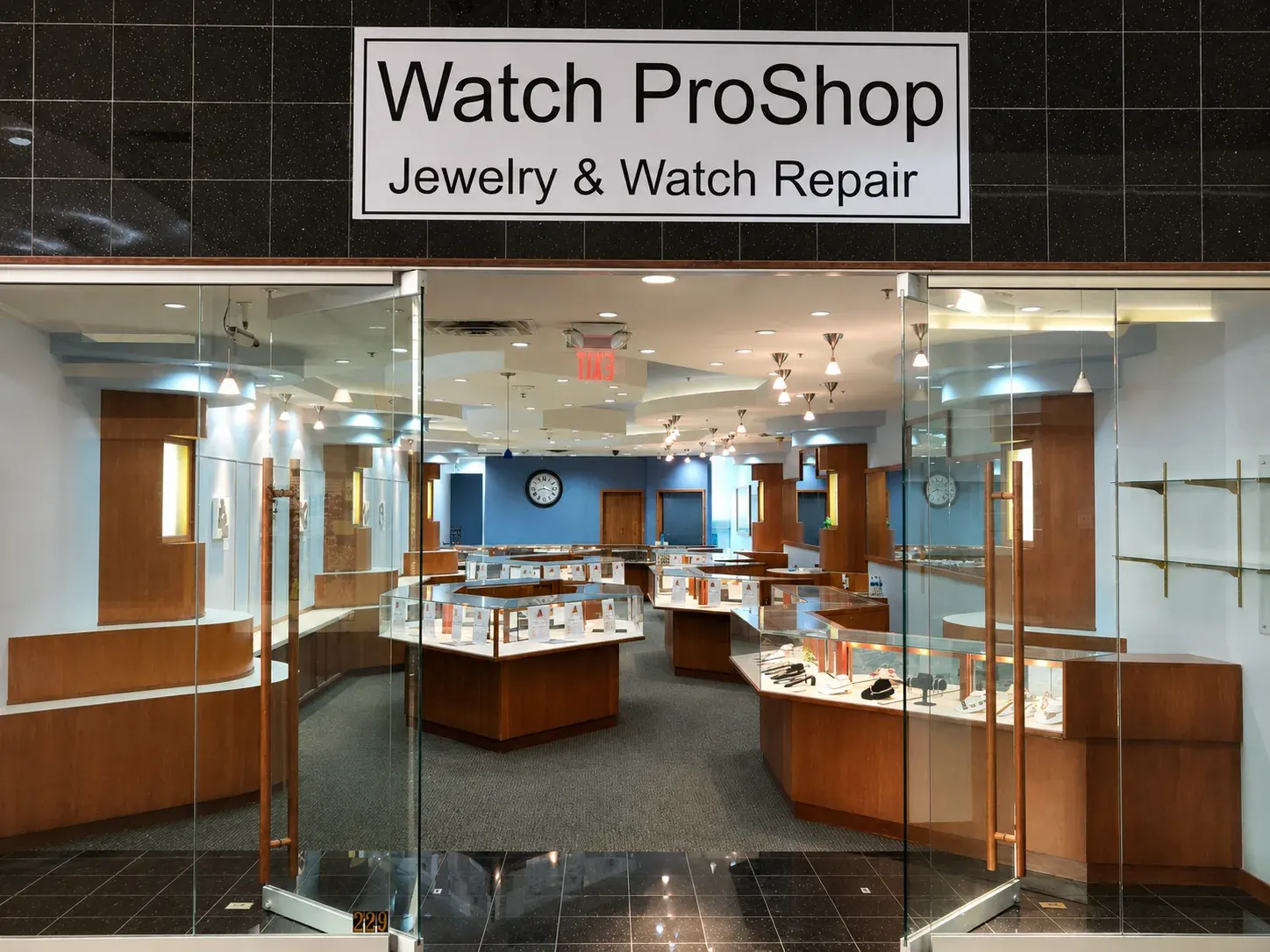 The Watch ProShop storefront entrance with display cases visible.